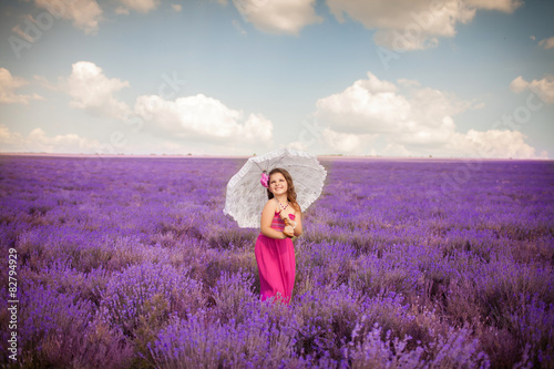 Fototapeta Naklejka Na Ścianę i Meble -  cute little girl lavender field outdoor portrait