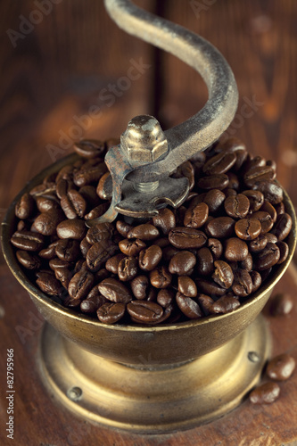 Coffee grains in old coffee grinder