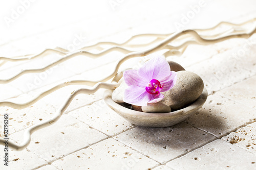 mineral cup with stones and flower for zen attitude
