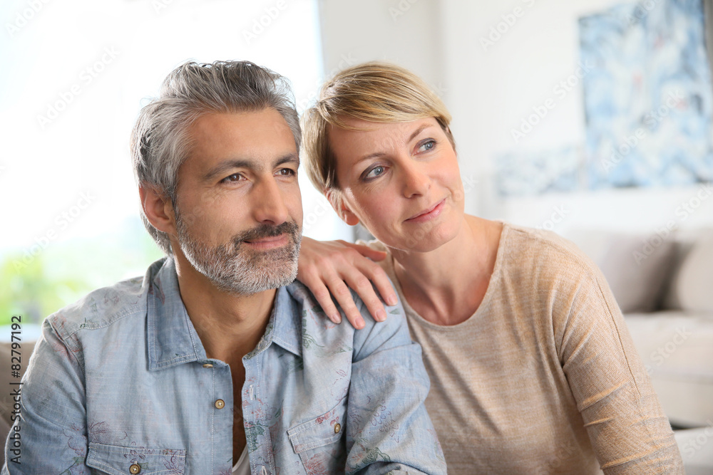 Loving mature couple looking towards the future Loving mature couple looking towards the future