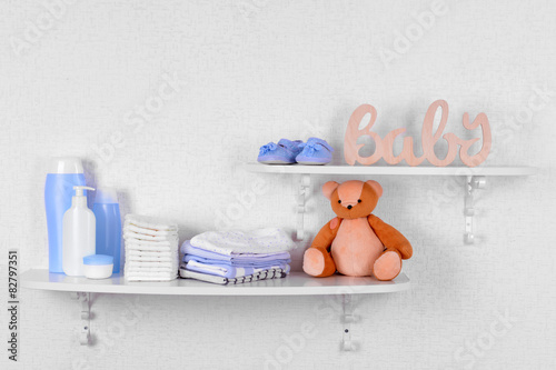 Baby accessories on shelves close-up