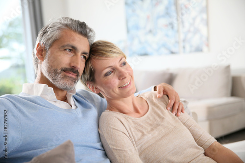 Loving mature couple looking towards the future