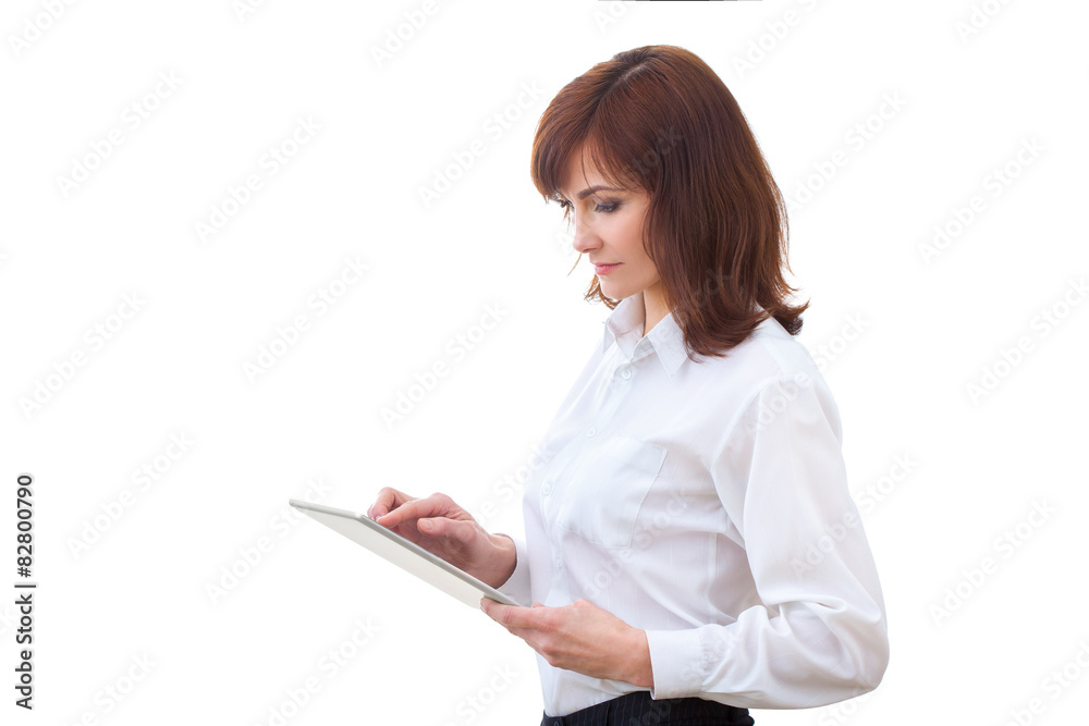 adult female in shirt using tablet adult female in shirt using tablet