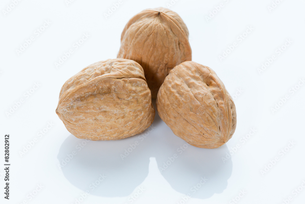 Isolated walnuts on white close up Isolated walnuts on white close up