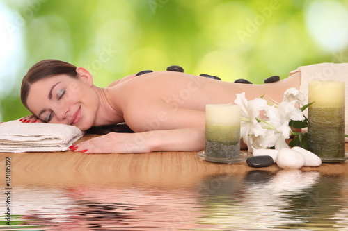 young girl lying in a spa