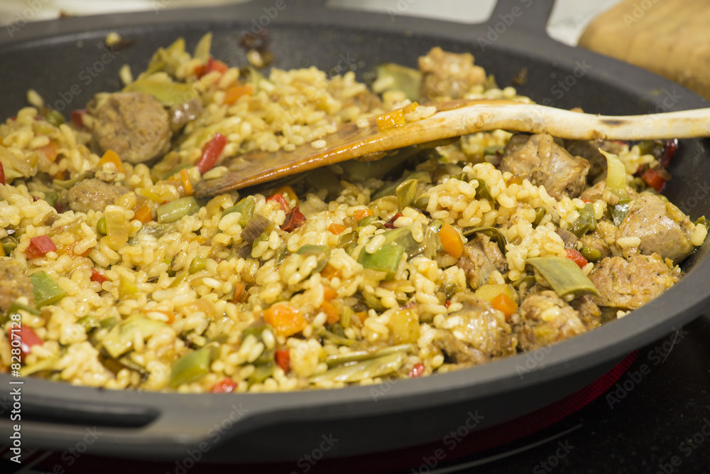 Spanish paella ready to serve close up Spanish paella ready to serve close up