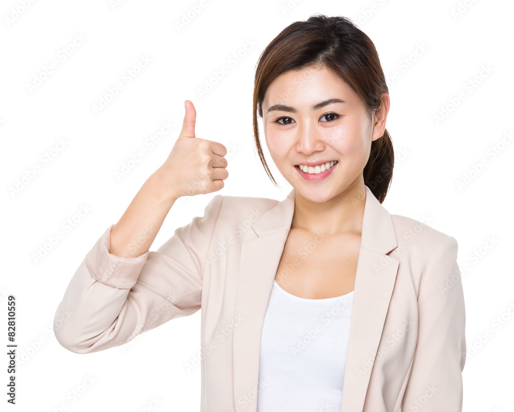 Asian businesswoman with thumb up gesture Asian businesswoman with thumb up gesture