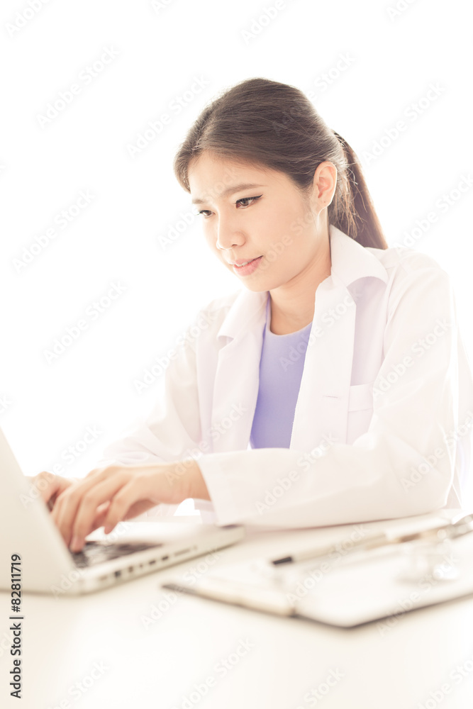 Young and professional doctor working in office Young and professional doctor working in office