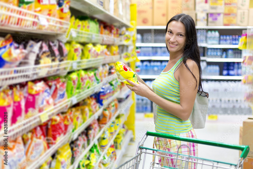 Woman checking food labelling