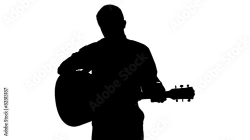 Black silhouette of guy playing guitar on a white background