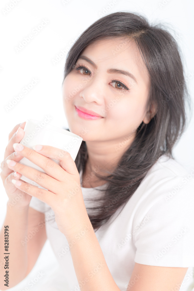 beautiful young woman hold cup of coffee lying think relaxing on beautiful young woman hold cup of coffee lying think relaxing on