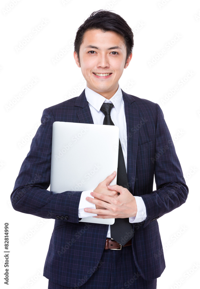 Young businessman hold with laptop computer Young businessman hold with laptop computer
