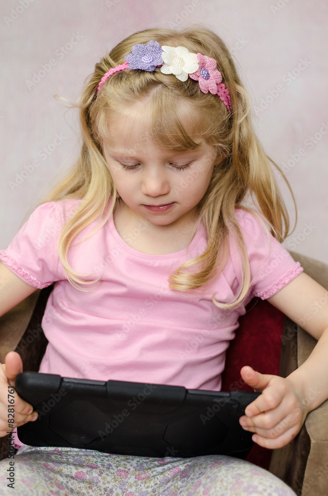 girl with tablet device girl with tablet device