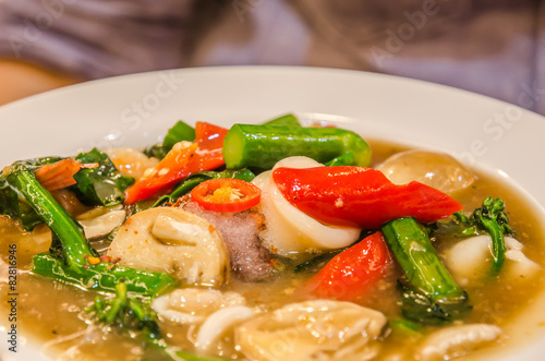 Photography Fried noodle with pork and broccoli