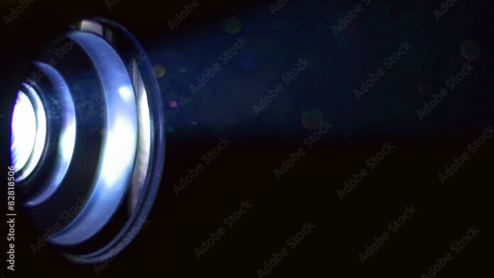 The very bright projector light with seen lens. Macro close up view The very bright projector light with seen lens. Macro close up view