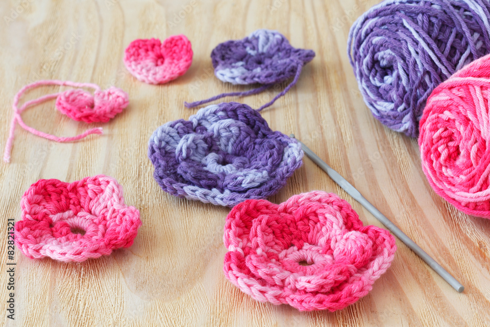 Handmade pink and purple crochet flowers and heart