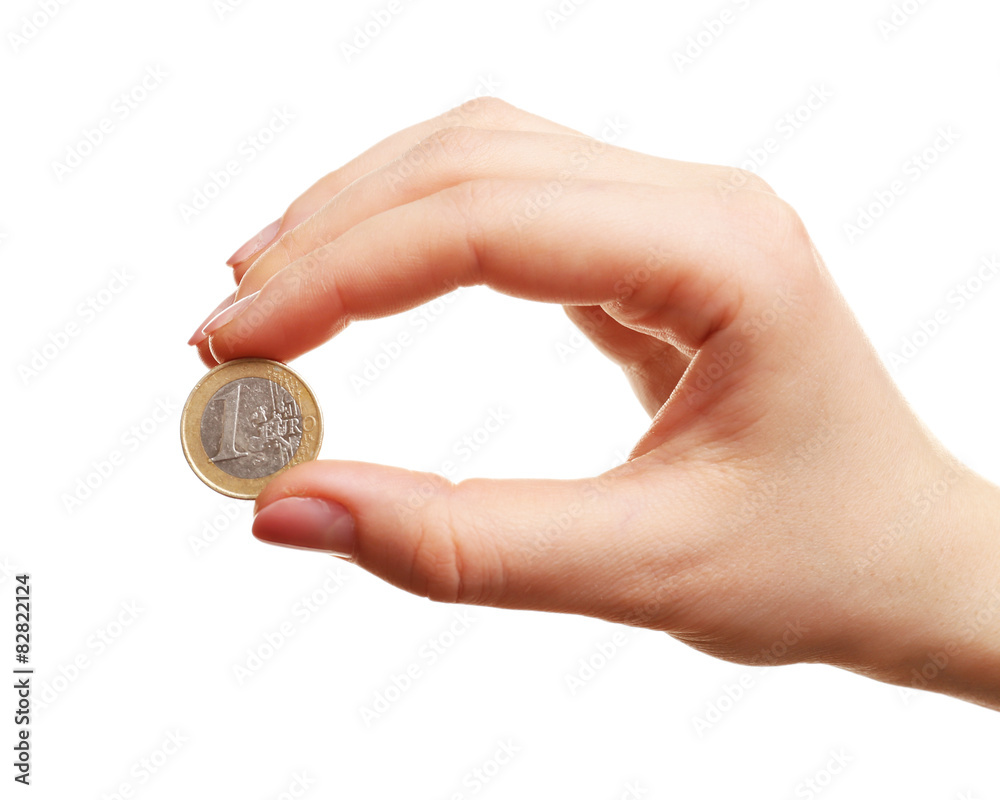 Female hand with coin isolated on white Female hand with coin isolated on white