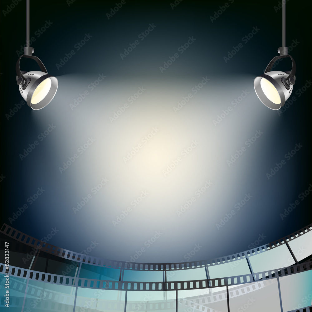 Fototapeta premium blue background with spot lights and filmstrip