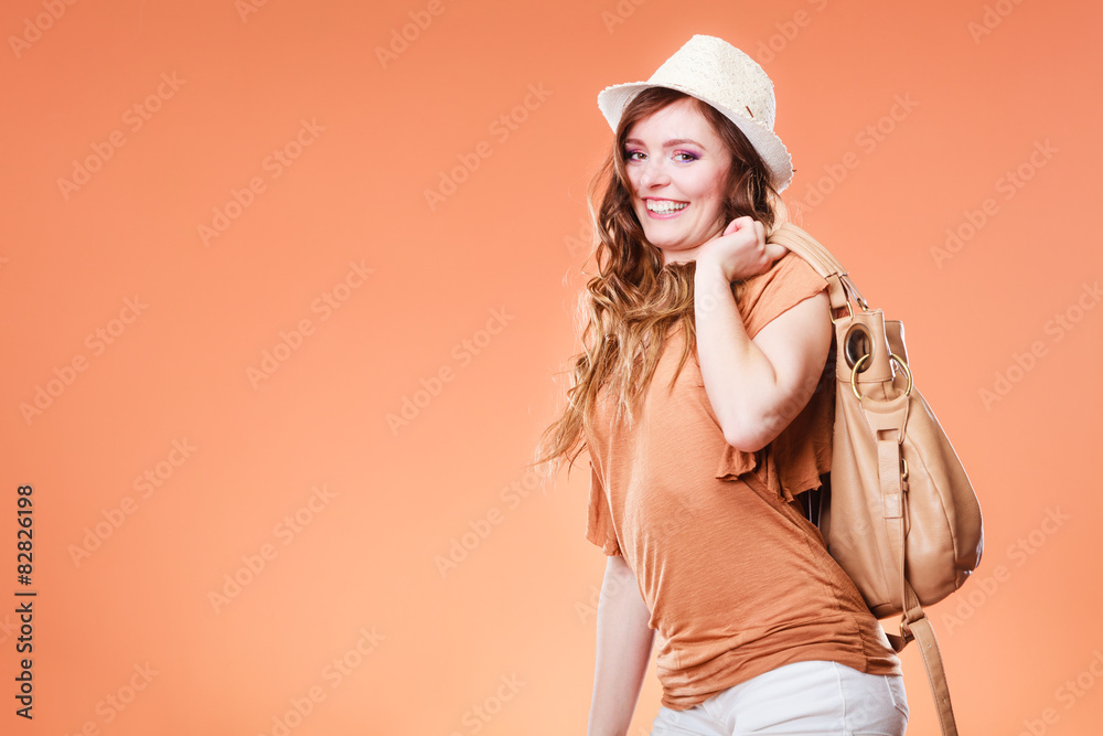 Lovely woman in summer hat handbag portrait