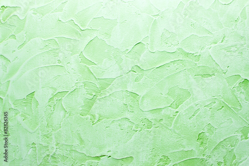 background made with a texture of a green wall