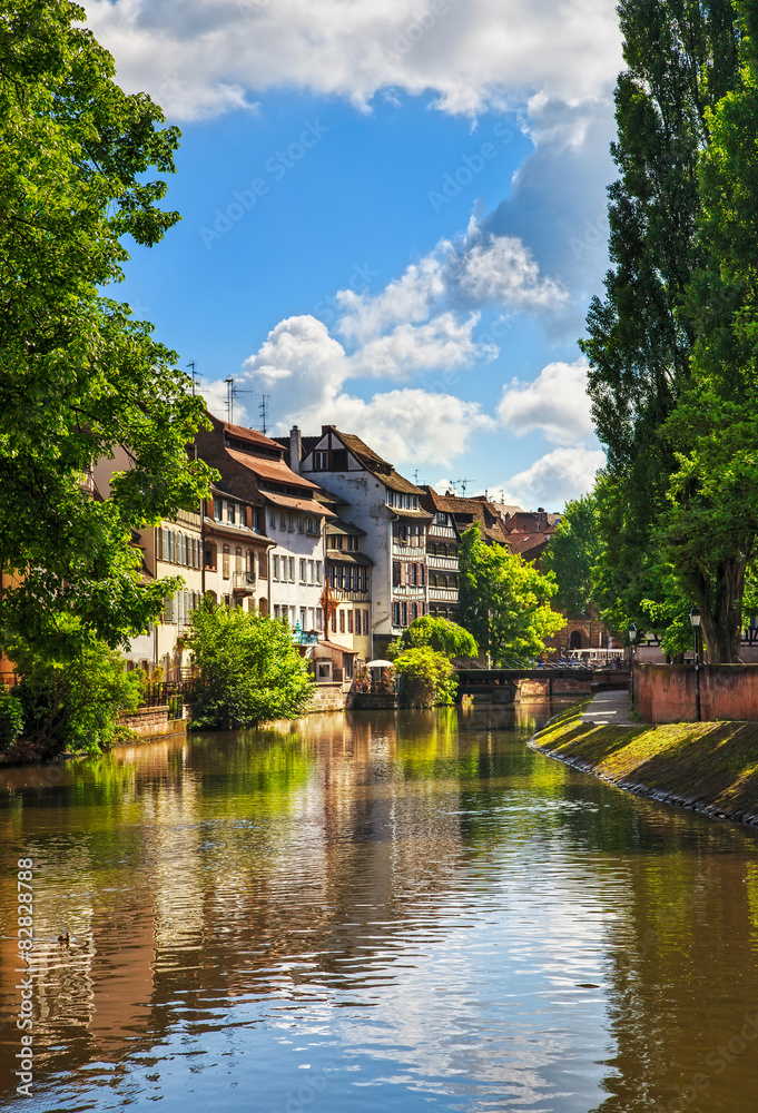 Fototapeta premium Strasbourg, water canal in Petite France area, Unesco site. Alsa