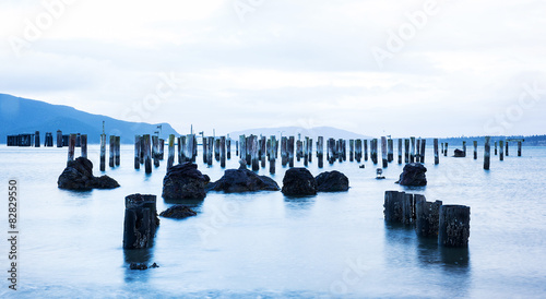 abandoned pier on a calm ocean