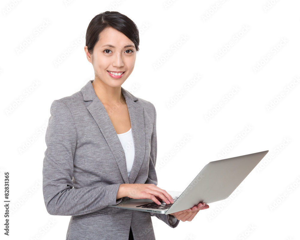 Businesswoman use of laptop computer Businesswoman use of laptop computer