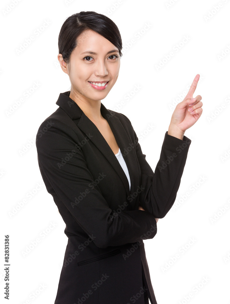 Businesswoman with finger pointing up Businesswoman with finger pointing up