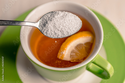 Sweetener in a cup of tea