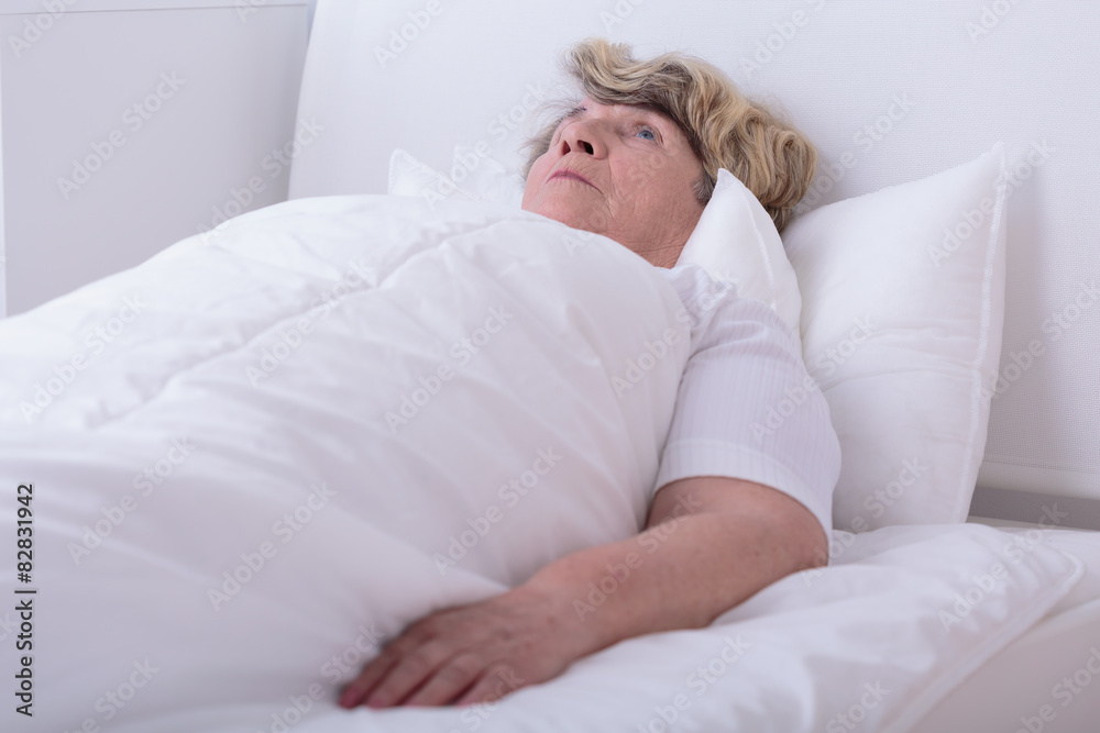 Woman lying on her back