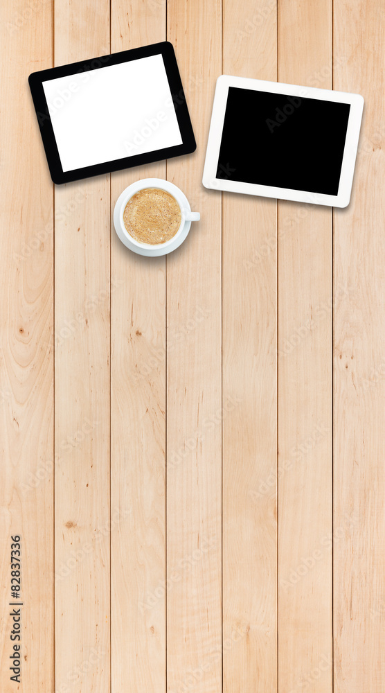 Two tablet PCs and coffee on a wooden table