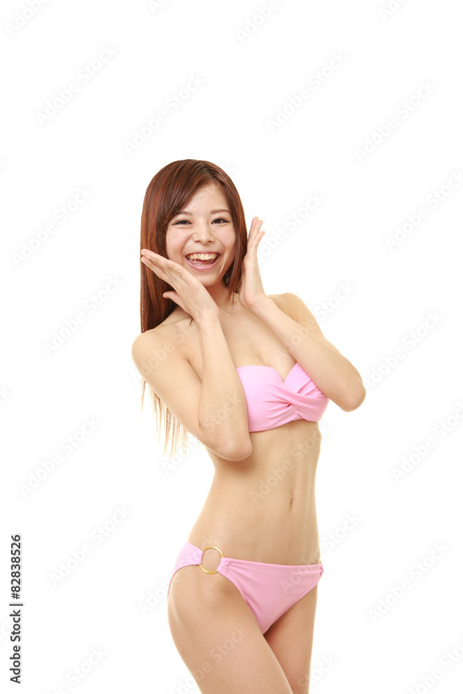 Fototapeta premium 喜ぶビキニの女性