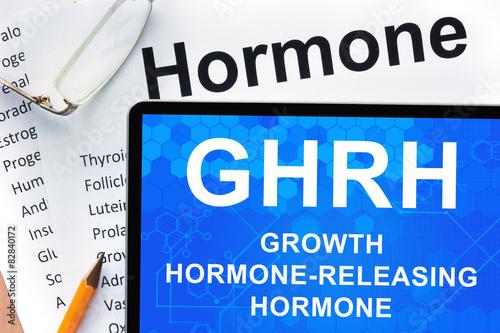   tablet  with words Growth hormone-releasing hormone (GHRH)  .  photo
