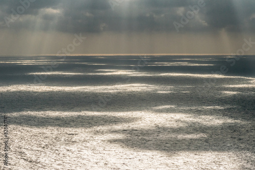 Sun rays breaking through to sea 