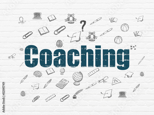 Education concept: Coaching on wall background