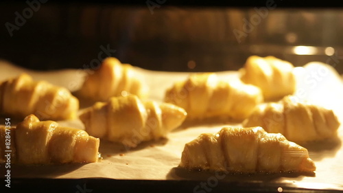 Croissants baking in oven