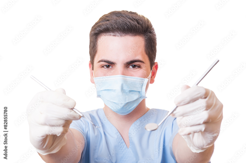 Dentist showing tools Dentist showing tools