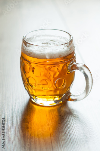 czech beer in the glass on vintage background