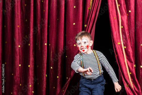Happy little boy actor making his entrance