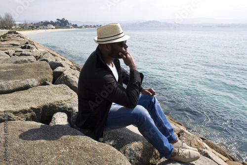 black man in the coast photo