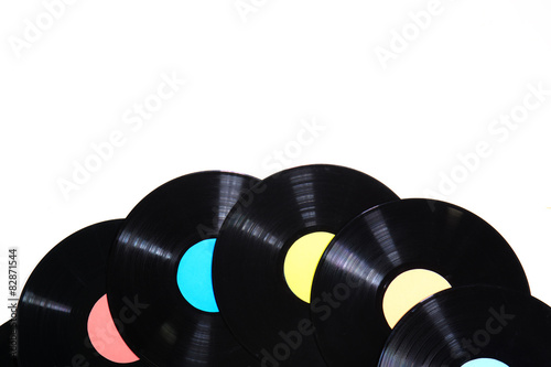 Old used vinyl record on a white background photo