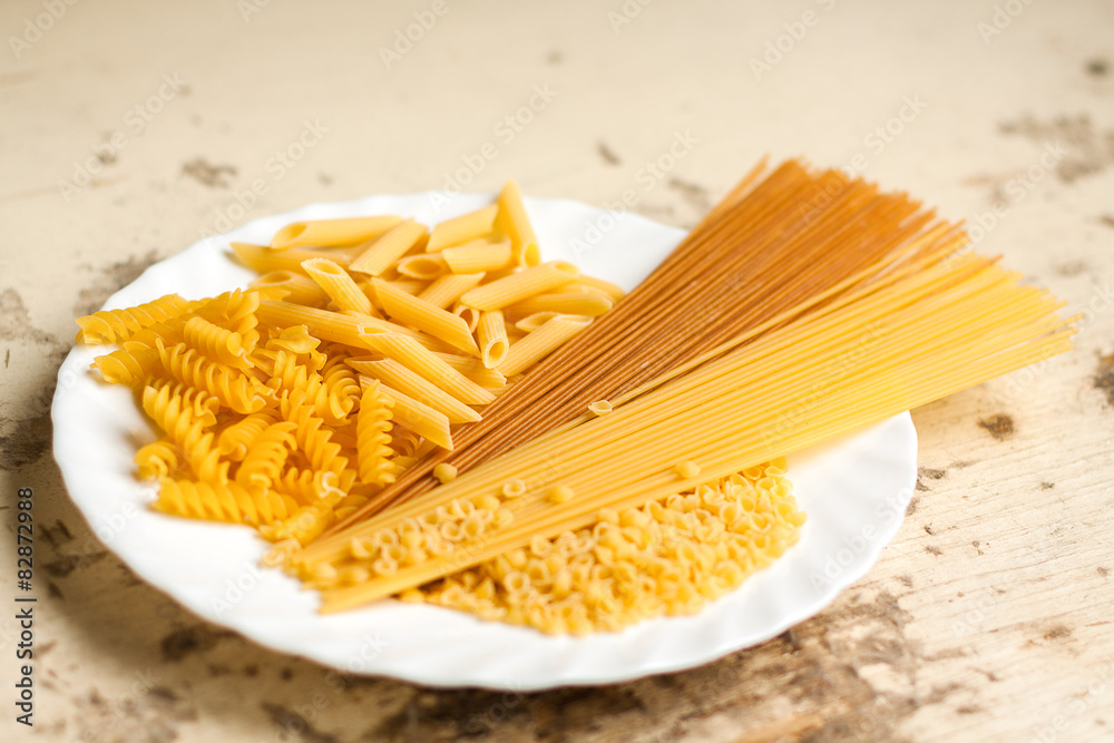 Паста в тарелке на столе Stock Photo | Adobe Stock