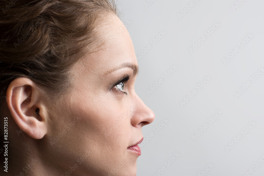 Beauty portrait of young girl in profile with brown hair