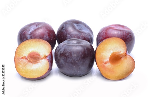 Plums isolated on white background