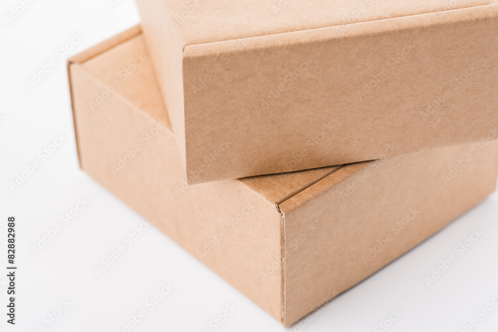 Brown cardboard boxes on a white background Brown cardboard boxes on a white background