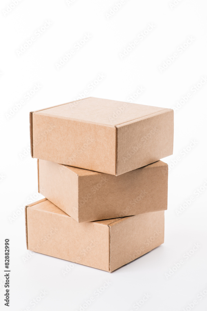 Brown cardboard boxes on a white background Brown cardboard boxes on a white background