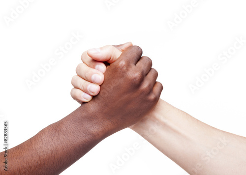 Handshake of friendship and respect, racism concept