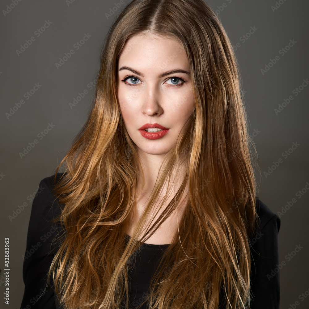 portrait of beautiful young woman with brown hair and make-up portrait of beautiful young woman with brown hair and make-up