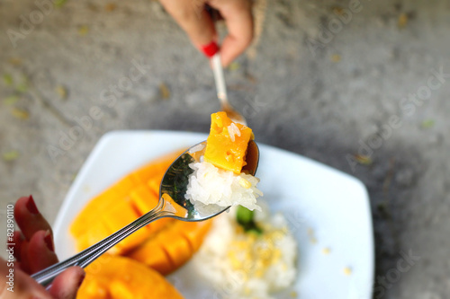 sticky rice with coconut milk mix and ripe mango.