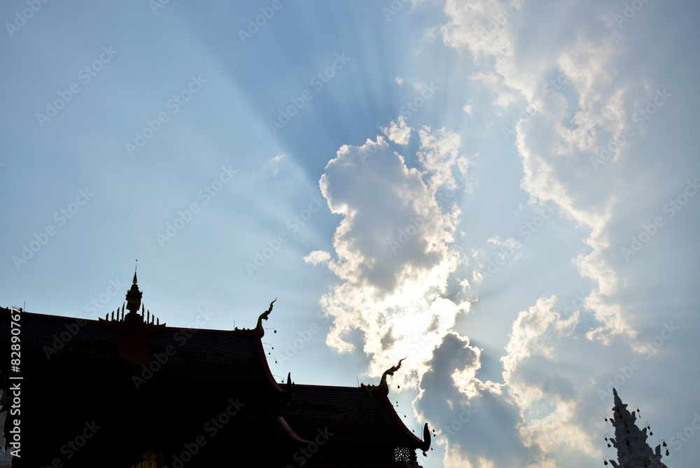 Fototapeta premium clouds on Sky shine over the roof of the castle